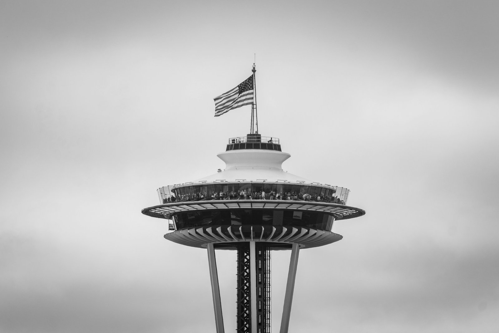 flag of usa on top of space needle