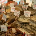 A bunch of different types of sea food